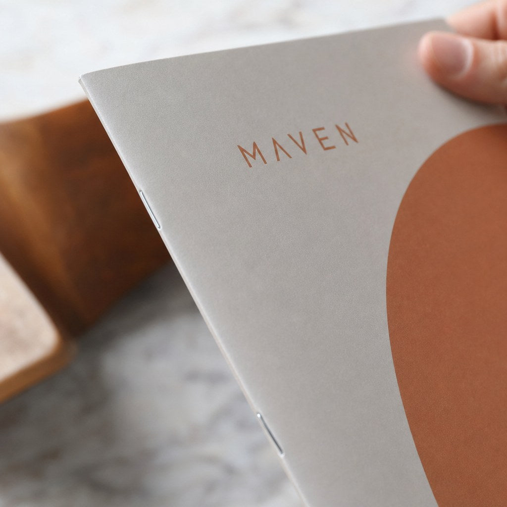 Stapled Booklets – close-up: Close-up of the saddle-stitched staples in the spine