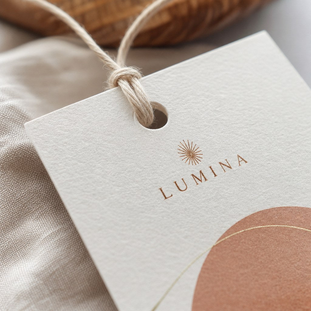 Hang Tags – close-up: Close-up of the punched hole and natural cotton string